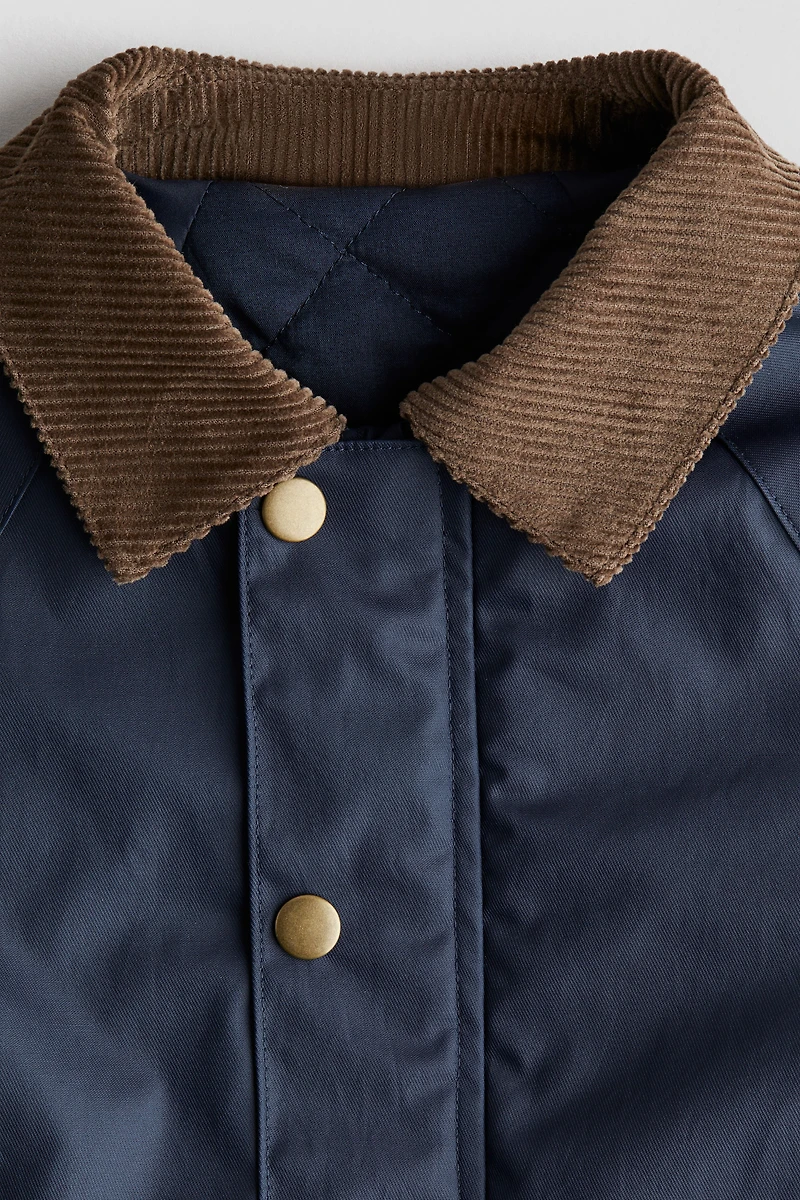 Manteau en coton ciré