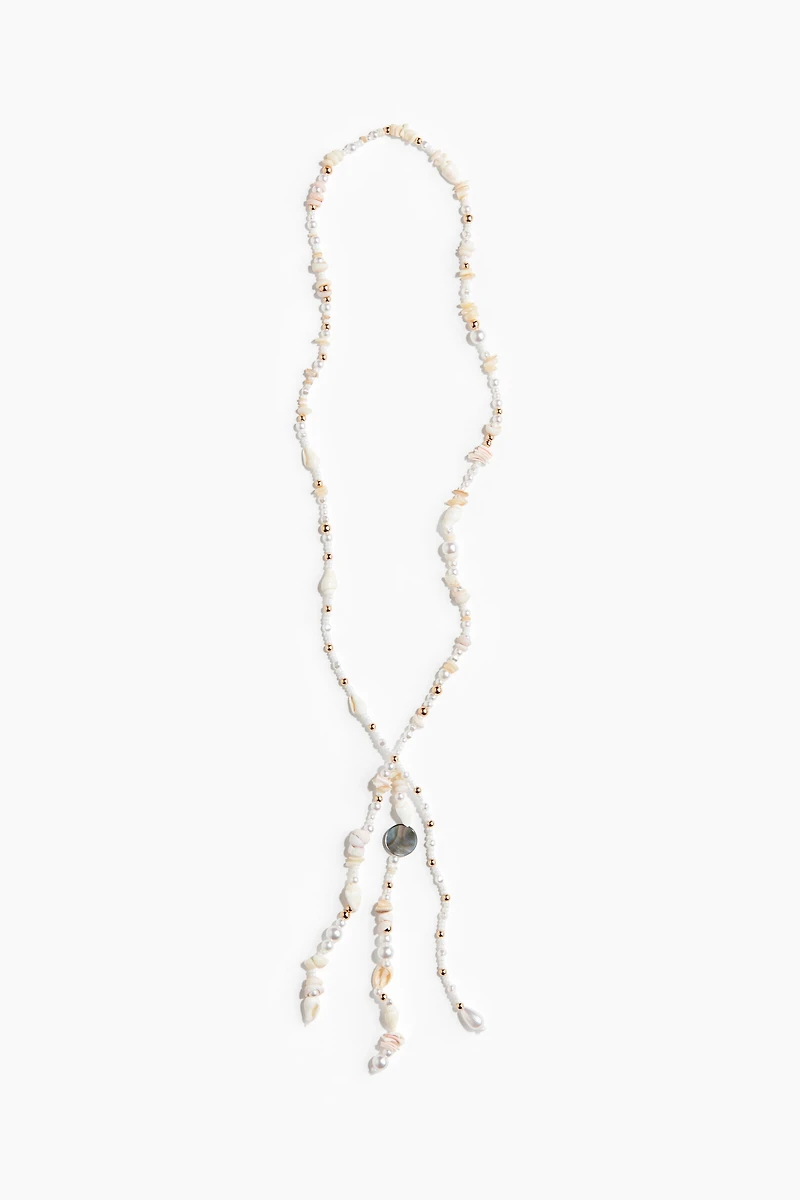 Collier avec perles fantaisie