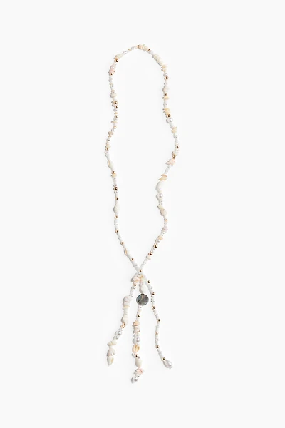 Collier avec perles fantaisie