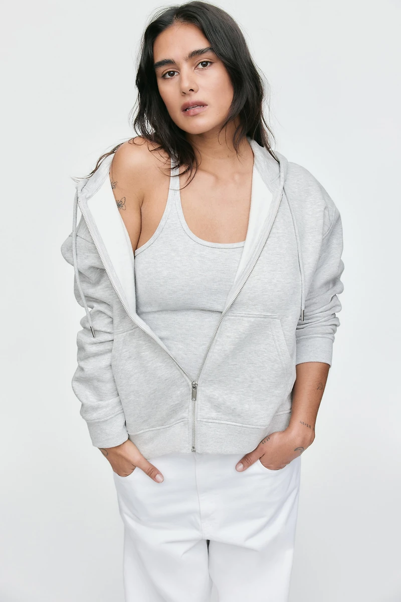 Veste à capuchon glissière