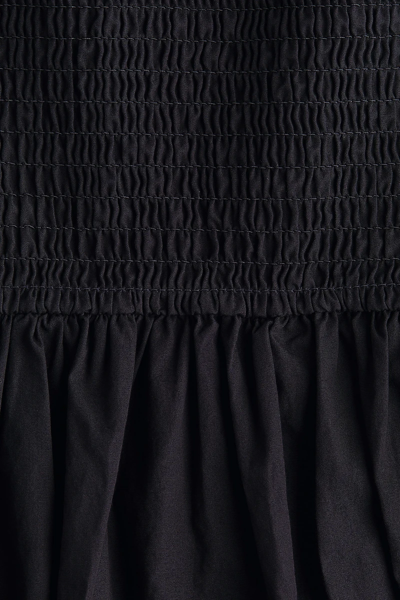 Robe à bretelles fines en coton avec jupe évasée