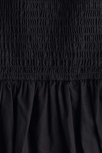 Robe à bretelles fines en coton avec jupe évasée