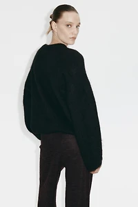 Pantalon large en bouclette