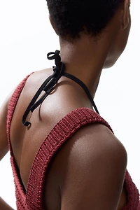 Haut d'aspect crocheté