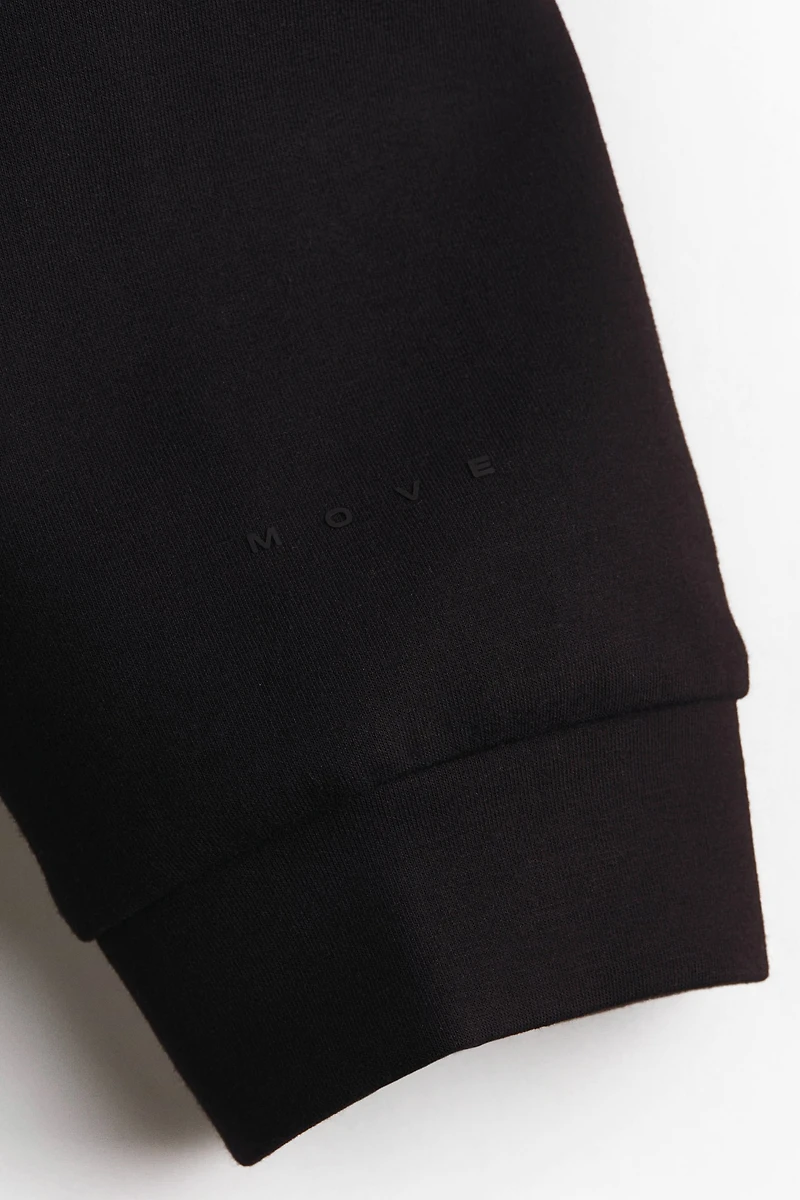 Veste sport fermeture éclair et capuche DryMove🅪