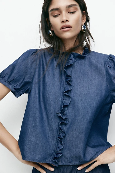 Blouse volantée en denim