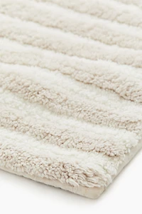 Tapis de bain en coton touffeté