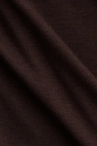 Draped Asymmetric Top