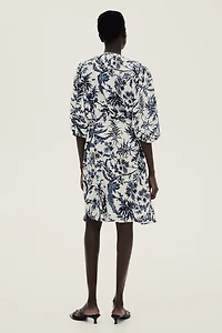 Robe à manches bouffantes