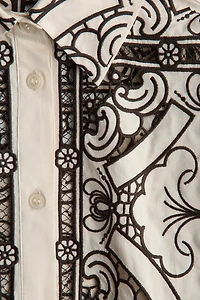 Veste avec broderie anglaise