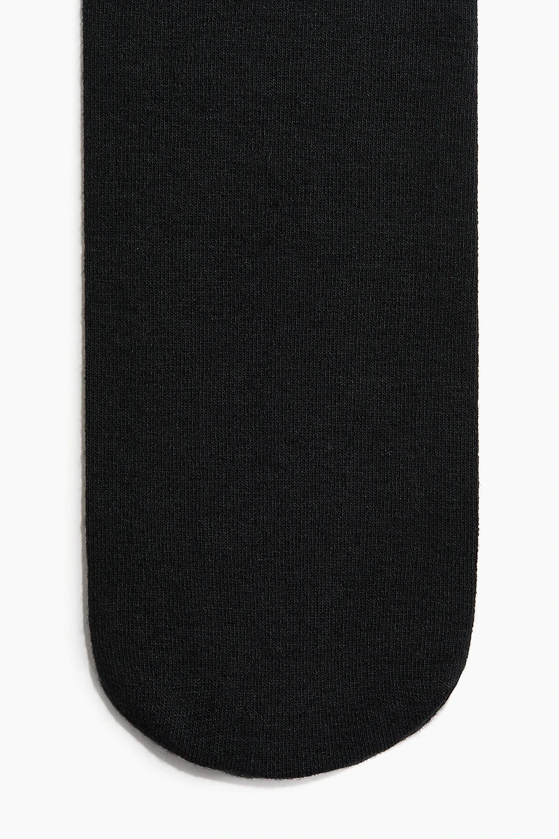 Lot de 2 collants en fin tricot