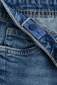 Jean décontracté taille basse jambe évasée