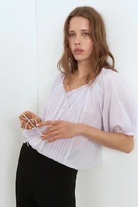 Blouse à plis nervurés