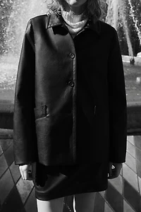 Veste en tissu enduit