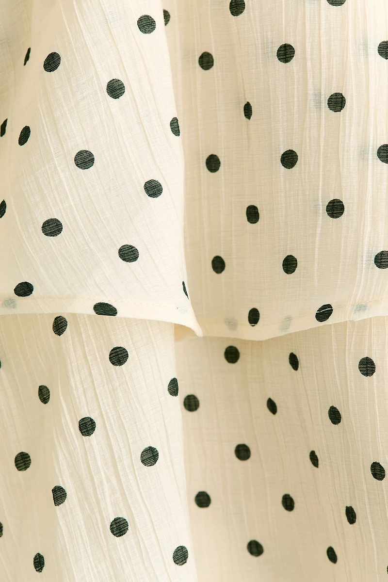 Robe plissée avec jupe évasée