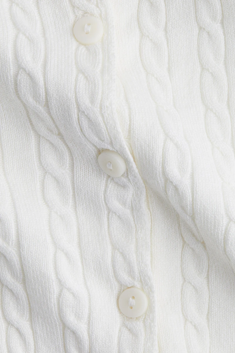 Gilet en tricot torsadé