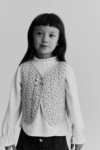 Chandail sans manches matelassé en mousseline