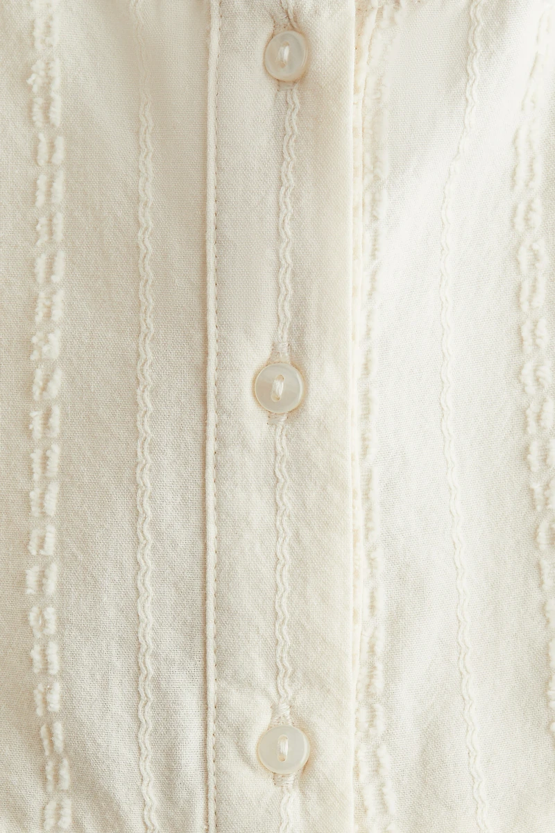 Sleeveless Ruffled Blouse