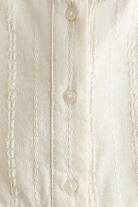 Sleeveless Ruffled Blouse