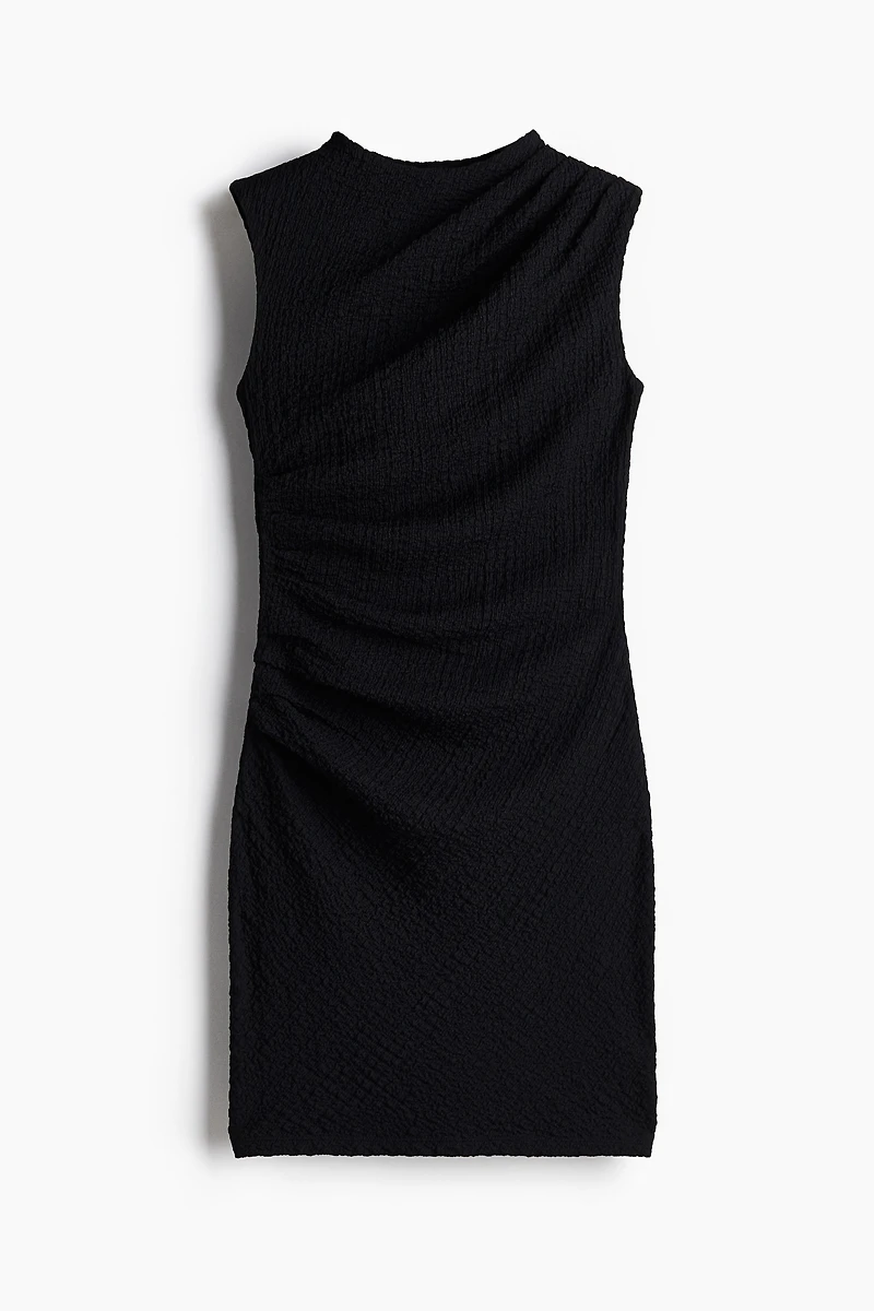 Robe moulante à effet drapé
