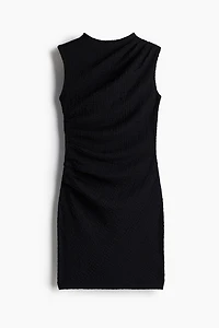 Robe moulante à effet drapé