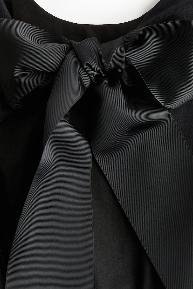 Robe avec jupe à effet bouffant au bas