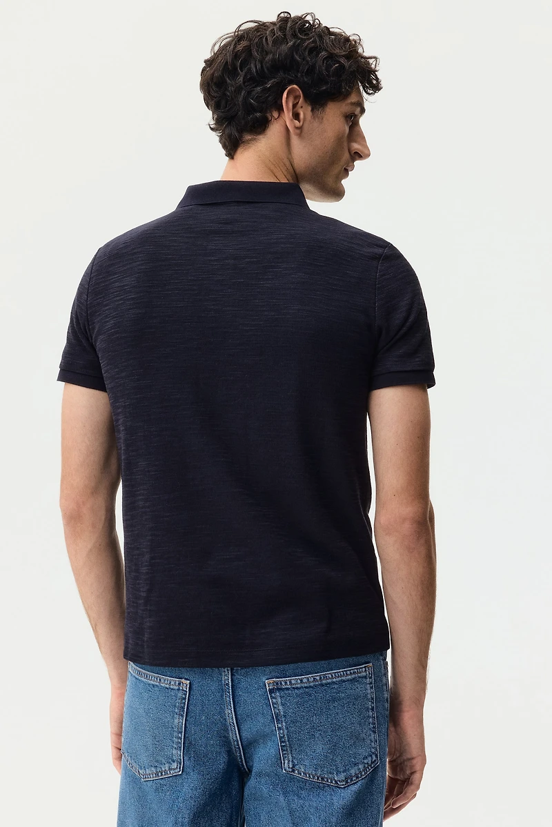 Polo près du corps en tricot jacquard