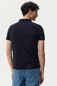 Polo près du corps en tricot jacquard