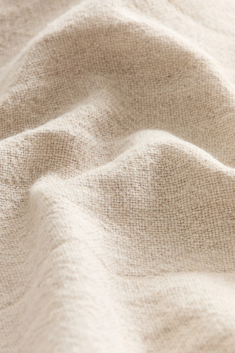 Housse de coussin en lin mélangé