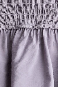 Robe épaules nues à volants