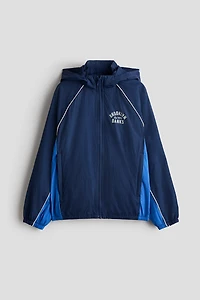 Veste coupe-vent à capuche en nylon