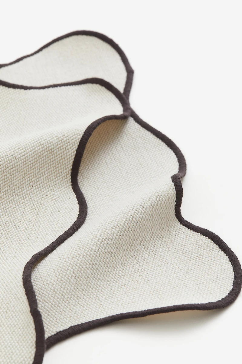 Lot de 2 napperons à bords festonnés