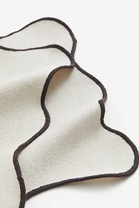 Lot de 2 napperons à bords festonnés