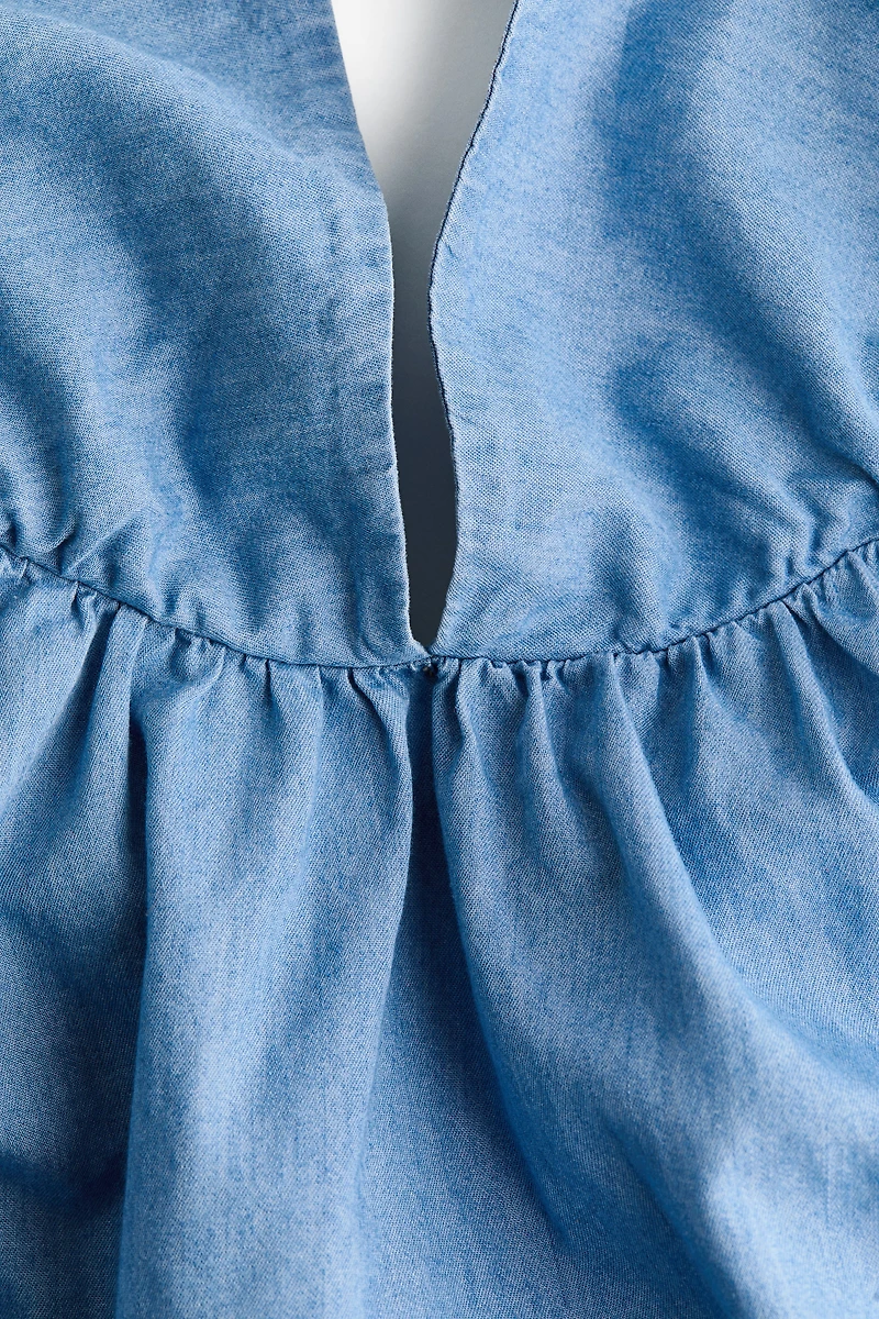 Haut à dos nu en denim