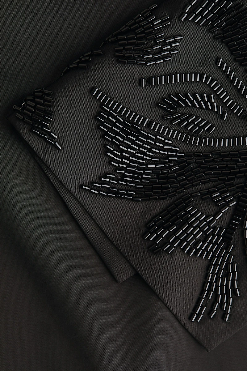 Blouse à dos bénitier avec perles de fantaisie