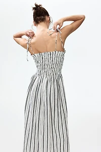 Robe avec bretelles à nouer et corsage smocké