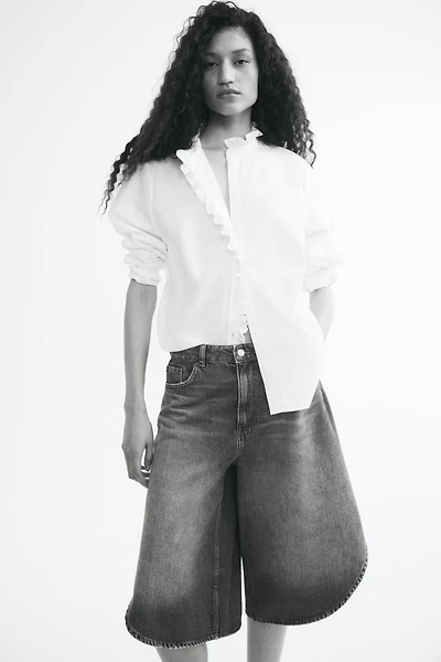 Blouse volantée à boutons