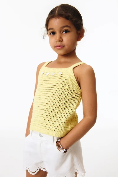 Haut ornementé en tricot