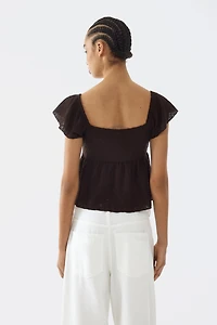 Blouse en jersey pointelle