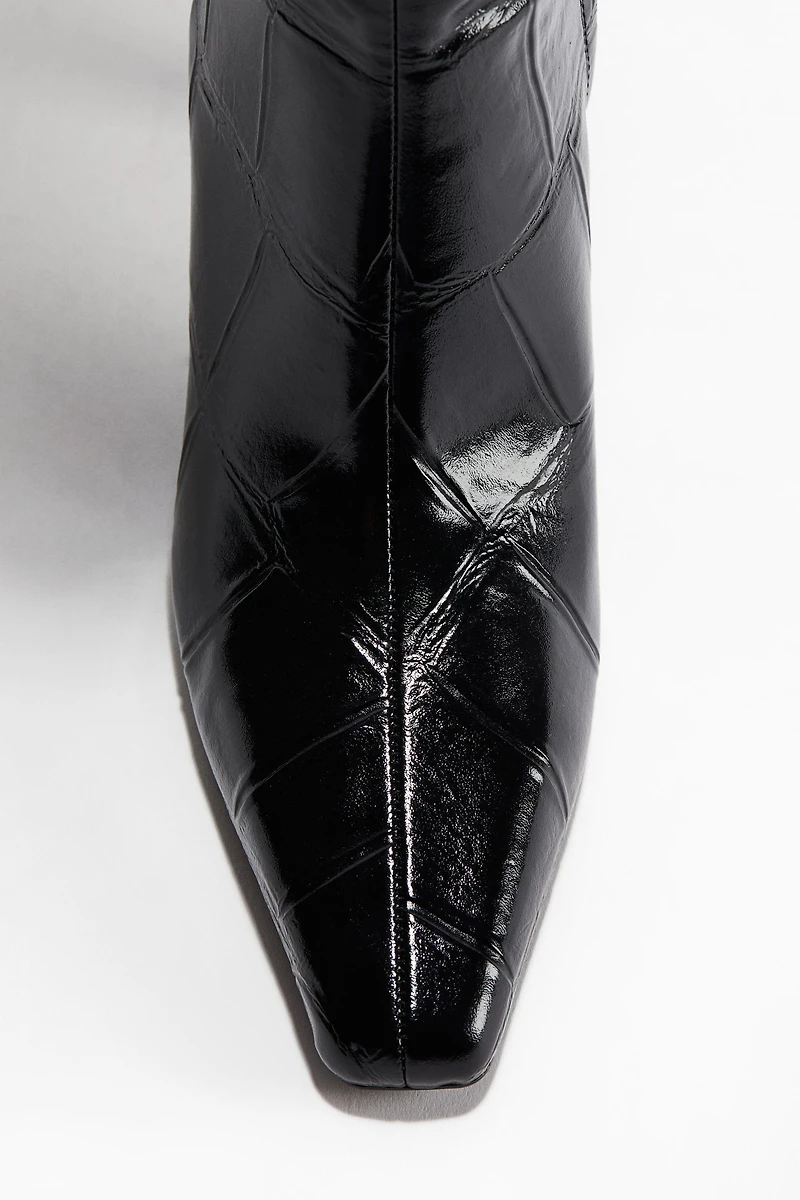 Bottes à talon au genou