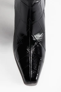 Bottes à talon au genou