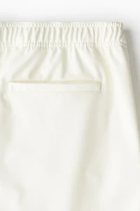 Short enduit Coupe Décontractée