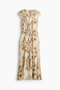 Robe plissée à imprimé fleuri et dos ouvert