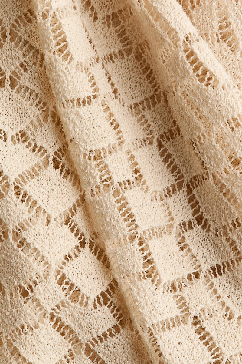 Haut d’aspect crochet avec col écharpe