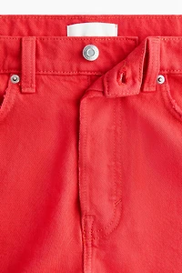 Short en denim avec bords coupés