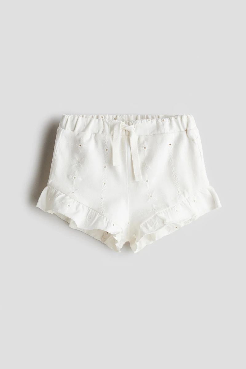 Short en jersey avec broderie anglaise
