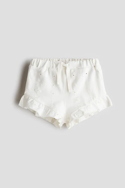 Short en jersey avec broderie anglaise