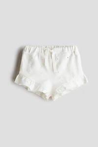 Short en jersey avec broderie anglaise