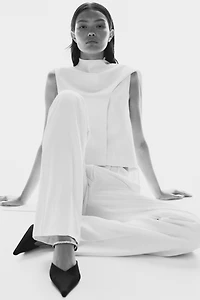 Mules à talon ornementées