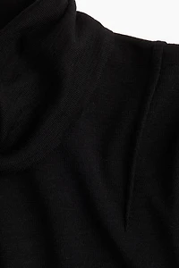 Haut à col cheminée en laine mérinos